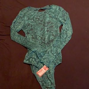 Green lingerie body suit. With tags never worn